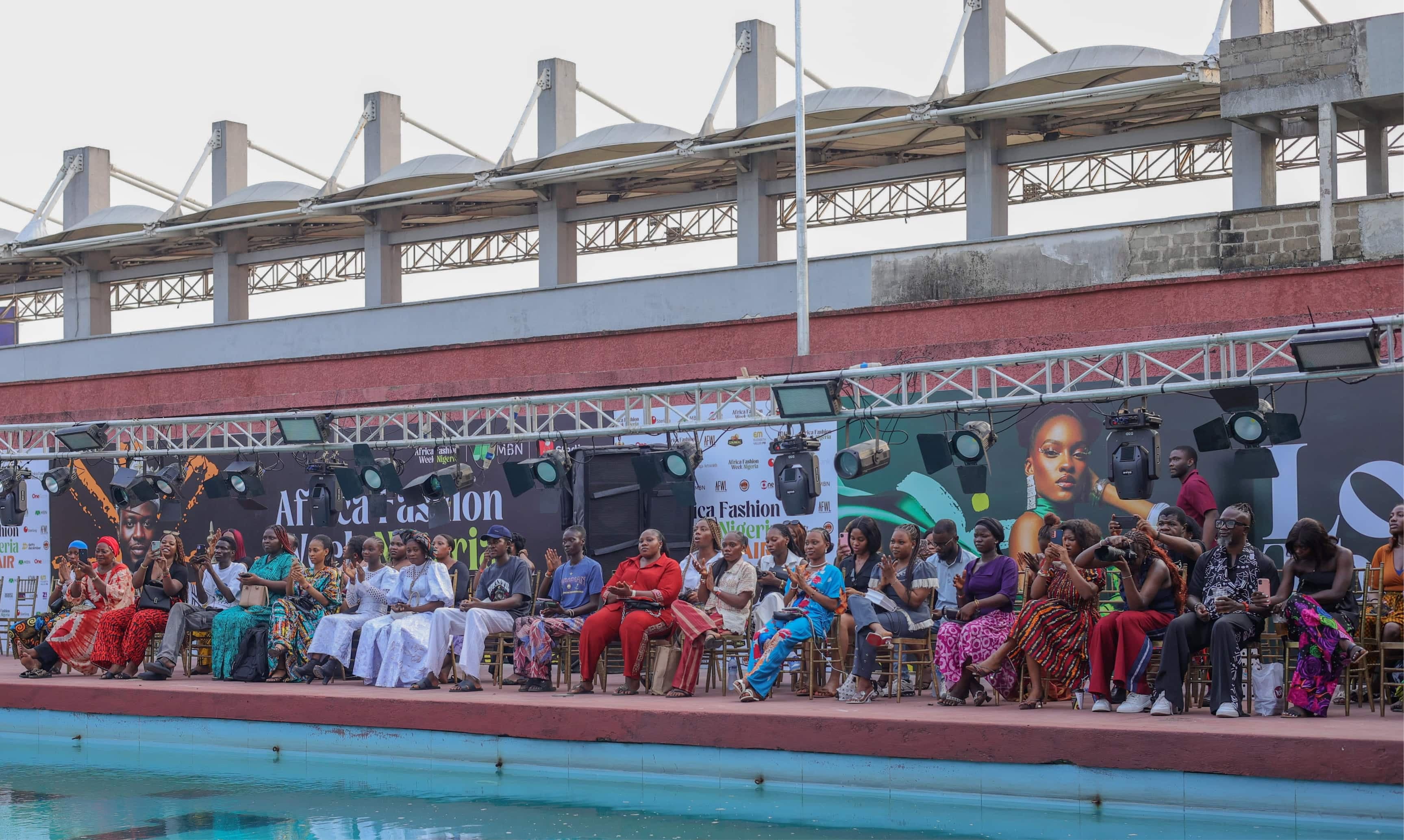 Audience watching the poolside runway