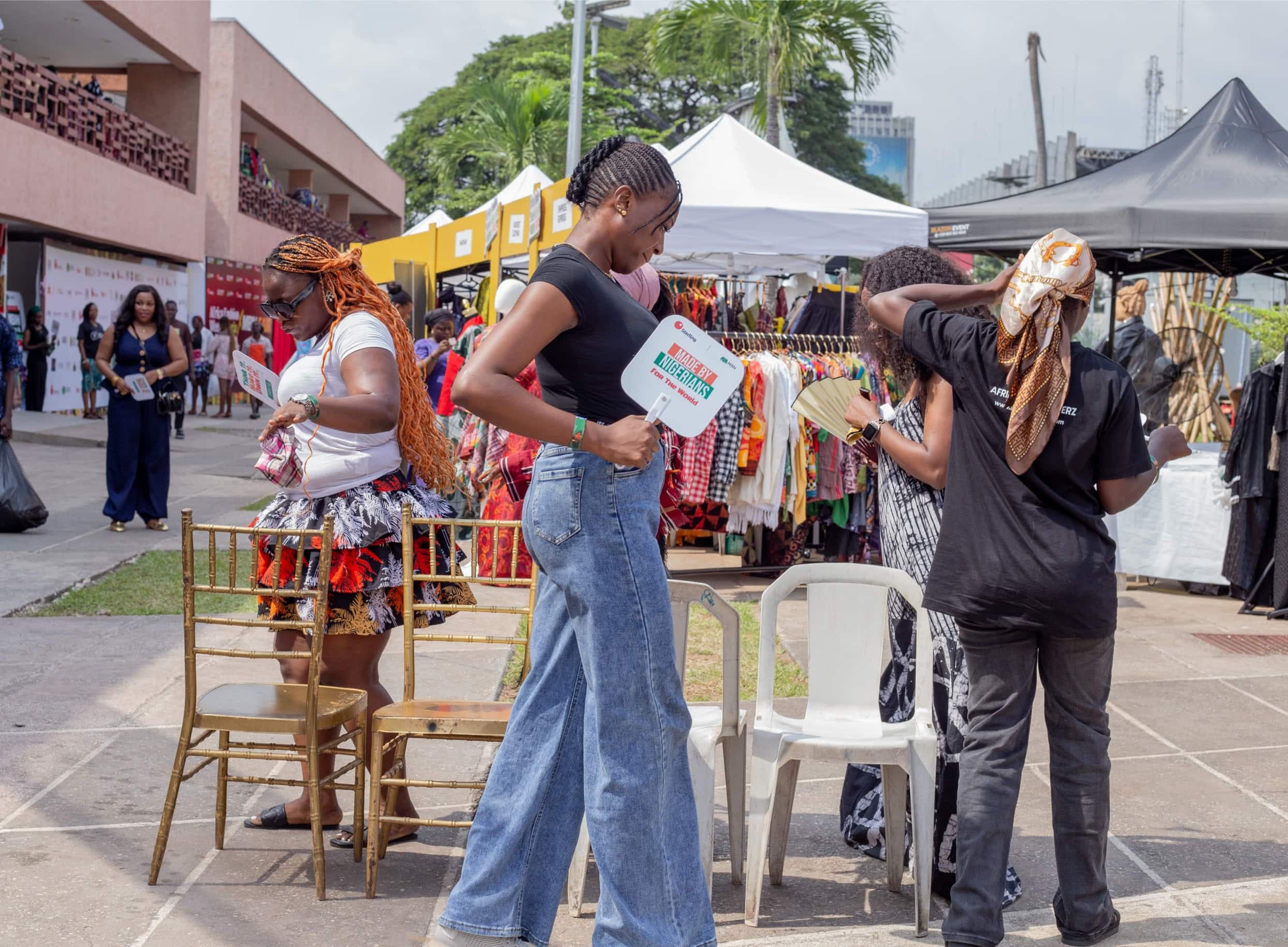 Shoppers browsing vendor stalls at the fair